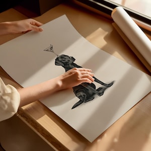 May include: A black and white illustration of a black Labrador Retriever balancing a martini glass on its nose. The dog is sitting, with its front paws extended. The artwork is on a large, off-white paper.