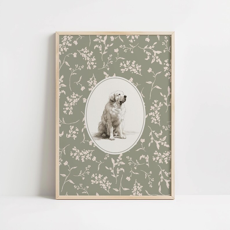 May include: A framed print with a detailed illustration of a Golden Retriever dog in an oval frame. The background is sage green with a delicate floral pattern. The artwork is encased in a light wood frame.