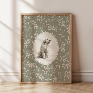 May include: A framed print with a sepia-toned illustration of a Golden Retriever. The dog is in an oval frame, set against a sage green background with a floral pattern. The wooden frame adds a classic touch to the artwork.