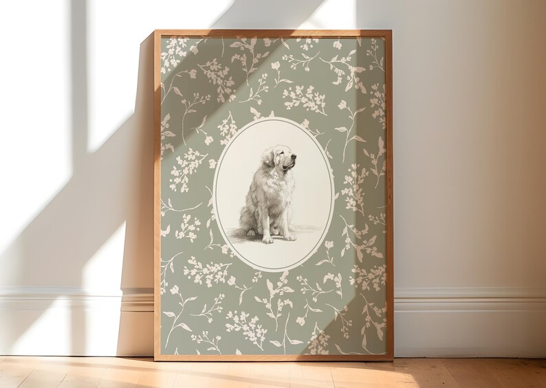 May include: A framed print with a detailed illustration of a Golden Retriever dog. The dog is in an oval frame, set against a sage green background with a white floral pattern. The wooden frame adds a classic touch.