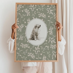 May include: A framed print with a seated dog illustration in an oval frame. The background is sage green with a floral pattern. The frame is made of light brown wood.