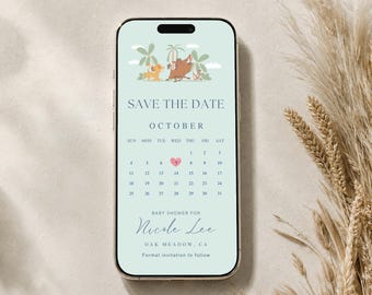 May include: A smartphone screen displaying a digital baby shower save the date invitation on a light green background. The design features cartoon animals, a calendar for October with a pink heart on the 7th, and the text Nicole Lee.