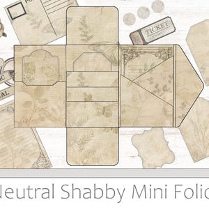 May include: A neutral-toned mini folio with a shabby chic design. It features a variety of pockets and compartments for storing small items, such as photos, notes, and tickets. The folio is decorated with floral patterns and the words "Vintage", "Shabby Chic", and "Botanical".