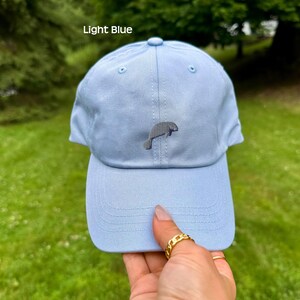 Summer Baseball Cap Manatee Embroidery Design Wildlife Themed Headwear Adjustable Dad Hat Ocean Lover Accessory Marine Animal Pattern Casual Outdoor Style Beach Vacation Essential Unstructured Low Profile Comfortable Fit Unique Gift Idea