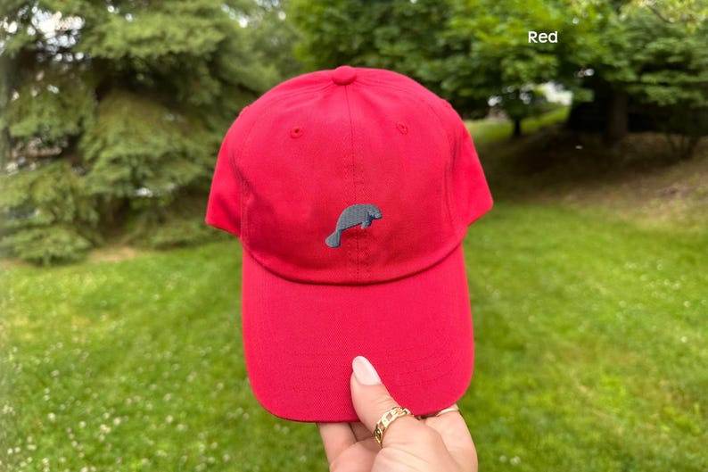 embroidered manatee hat, hat women baseball, baseball dad cap, cap animal design, design wildlife headwear, headwear adjustable strap, strap sea accessory, accessory ocean lover, lover marine gift, gift summer beach, beach casual style, style unstructured profile