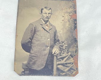 Antique Tintype Photograph Of A Gentleman In Suit Posing By Fence