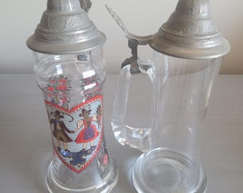 2 - 10" tall vintage beer steins.
