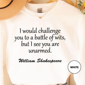 a t - shirt with a quote on it that says i would challenge you to