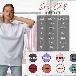 a woman wearing a white t-shirt, posing in front of a size chart for comfort colors.