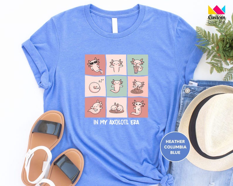 a t - shirt with a picture of cats on it