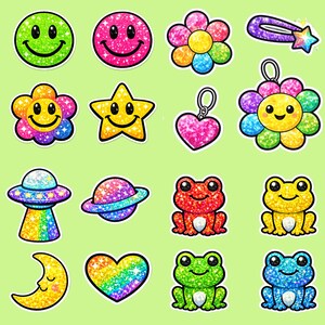 K&ouml;nnte beinhalten: Eine Sammlung glitzernder Aufkleber mit verschiedenen Designs auf hellgr&uuml;nem Hintergrund. Designs umfassen Smileys, Blumen, Sterne, eine Haarspange, einen Herzanh&auml;nger, ein UFO, einen Planeten, Fr&ouml;sche, einen Mond und ein Regenbogenherz.
