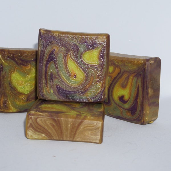 Woodstock is a bar soap made with cold processed technique.  Scented with Butt Naked Fragrance and has a very Hippie look. Great gift idea