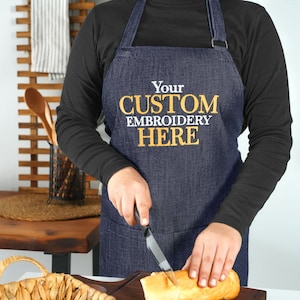 a person cutting a loaf of bread with a knife