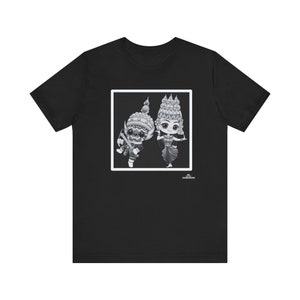 May include: Black t-shirt with a white square graphic featuring a cartoon illustration of a man and woman in traditional Thai costumes. The text "The Angkorian" is at the bottom of the graphic.