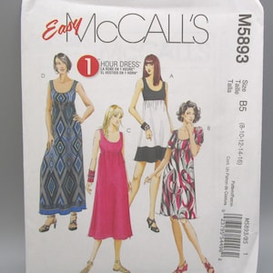 May include: McCall's sewing pattern M5893 for a one-hour dress. The pattern features illustrations of four dress designs, including a geometric print, a solid pink dress, and a black and white dress. Size B5 (8-10-12-14-16).