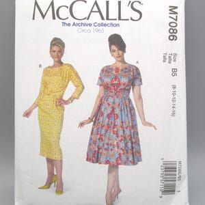 May include: A vintage McCall's sewing pattern, M7086, featuring two dress designs from The Archive Collection, circa 1963. The pattern includes sizes B5 (8-10-12-14-16). The cover displays illustrations of the dresses, one yellow and one floral.