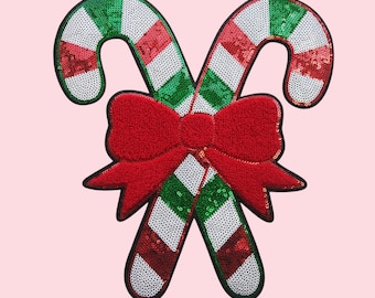 Toppa con fiocco a forma di bastoncino di zucchero con paillettes, applicazione natalizia da stirare (27,9 x 26,7 cm)