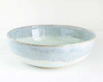 handmade ceramic bowl, subtle ocean inspired blues and greens,