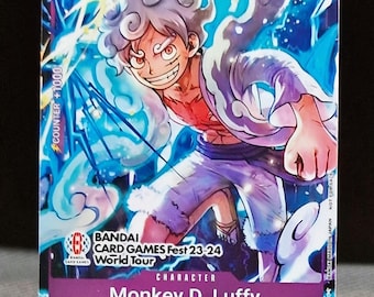 May include: A collectible trading card featuring Monkey D. Luffy from the anime One Piece. The card is purple and blue with a white border. The card has a picture of Luffy in a white and red outfit with a blue background. The card has the text "COUNTER +1000", "10", "12000", "STRIKE", "BANDAI CARD GAMES Fest 23-24 World Tour", "CHARACTER", "Monkey D. Luffy", "The Four Emperors / Straw Hat Crew", and "P-041 2".