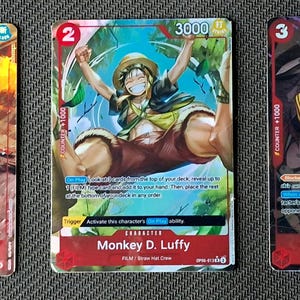 One Piece-Ersatzkarte Holo – Shanks Monkey D. Ruffy Shuraiya – OP06 Charakter rot
