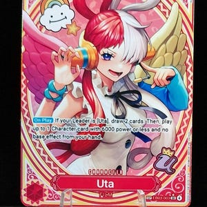 May include: A trading card featuring Uta from the Film series. The card has a red and white colour scheme with a character illustration. The card has a power level of 7000 and a cost of 5. The card also has text describing its play effect.