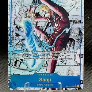May include: A trading card featuring Sanji from the Straw Hat Crew. The card has a blue and white background with Japanese text and a dynamic illustration of Sanji in action. The card's power is 9000.