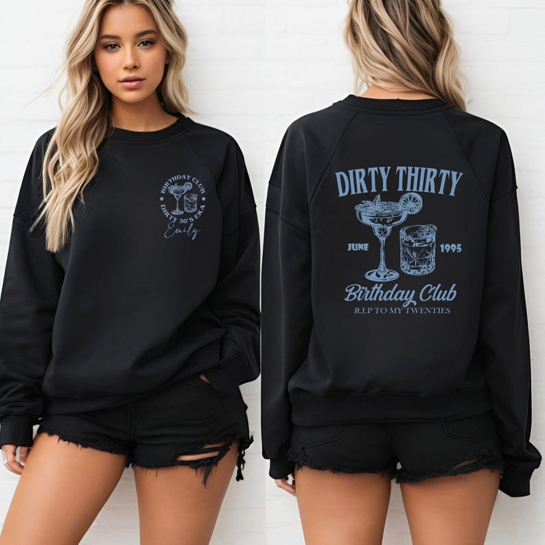 May include: Black sweatshirt with light blue text and graphics. The front features a cocktail graphic and the text "Dirty 30's Era" and "Emily". The back displays "Dirty Thirty", "Birthday Club", and "R.I.P. to my twenties" with a cocktail graphic.