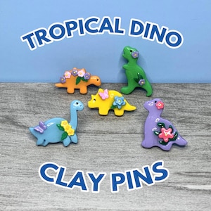 Tropical dino pins | Handmade Clay Pins | Cute T-rex, triceratops dinosaur pins with flowers