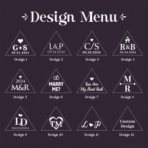 May include: A design menu showcasing 12 different options for wedding or engagement party favours. Each design features a white triangle with a unique graphic and text inside. The designs include initials, dates, and wedding-related phrases.
