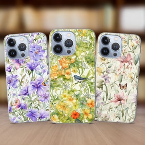 Könnte beinhalten: Drei iPhone-Hüllen mit Blumenmustern. Die erste Hülle hat lila Blumen, die zweite Hülle hat gelbe Blumen und die dritte Hülle hat rosa Blumen.