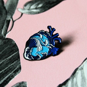 Anatomical heart. Medical student, nurse, surgeon decorative pin. Anatomy human heart, ocean waves.