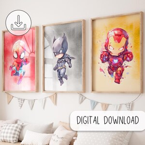 May include: Three framed watercolor prints featuring superhero characters: Spider-Man, Batman, and Iron Man. The prints have a cartoon style and are set against colorful backgrounds. The phrase "DIGITAL DOWNLOAD" is displayed on a white rectangle.