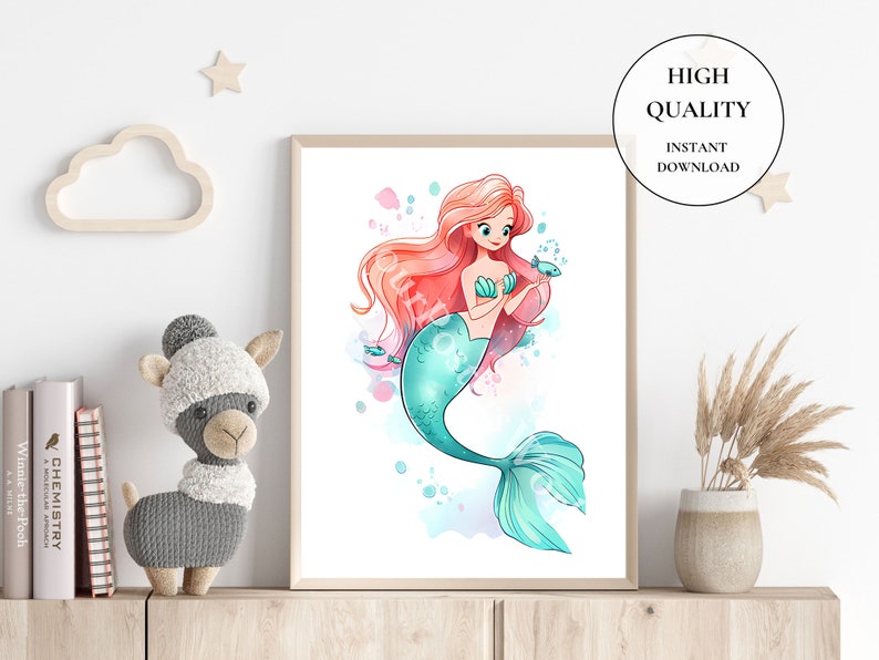 May include: A framed watercolor print of a mermaid with flowing red hair and a teal tail. She holds a small blue fish. The print is labeled "HIGH QUALITY INSTANT DOWNLOAD". The artwork is displayed on a shelf with decorative items.