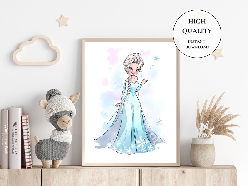 May include: A framed watercolor print of a princess in a blue gown with snowflakes. The print has a light blue and pink watercolor background. The text "HIGH QUALITY INSTANT DOWNLOAD" is in a circle in the upper right corner.
