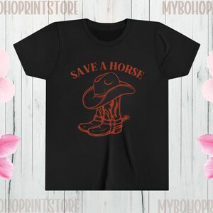 May include: Black t-shirt with a red graphic of a cowboy boot and hat with the text "Save a Horse" printed on it.