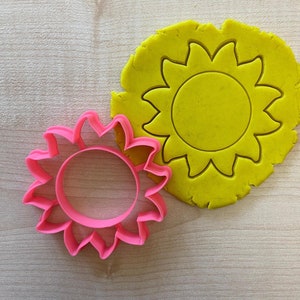 Kakform med sol, kakform med solsken, fondantstämpel med solskensdesign, kakform med vågig solplanet