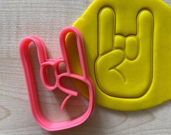 Rock-Zeichen-Hand-Haltung-Ausstechform, Heavy-Metal-Musikkultur, Handgeste Teufel-Hörner Index-kleine Finger-Daumen-Keks-Stempel