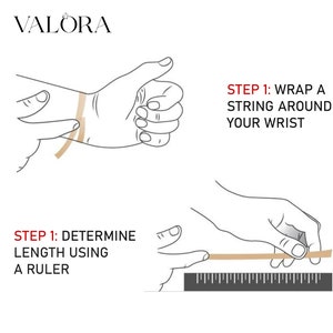 May include: Diagram illustrating how to measure wrist size for jewelry. The image shows a hand wrapping a string around a wrist and measuring the string's length with a ruler. Text reads "STEP 1: WRAP A STRING AROUND YOUR WRIST" and "STEP 1: DETERMINE LENGTH USING A RULER". The brand name "VALORA" is at the top.