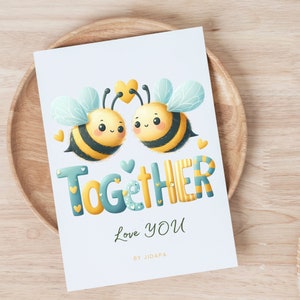 May include: A greeting card with a blue and yellow striped word "Together" and two cartoon bees with hearts. The text "Love You" is below the word "Together" and the text "By JIDAPA" is at the bottom of the card.