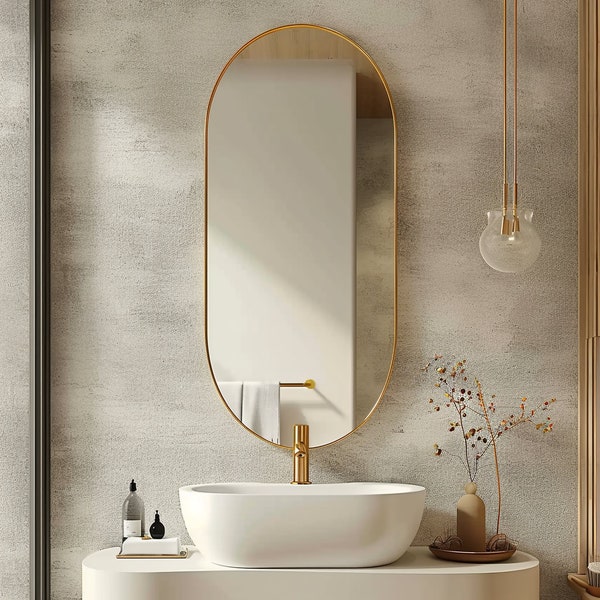 Miroir mural ovale allongé avec cadre doré – Miroir de salle de bain minimaliste, design élégant, accessoire de décoration d'intérieur élégant.