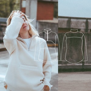 Peut inclure: Un sweat-shirt blanc en polaire avec une fermeture éclair et une poche sur le devant. Le sweat-shirt a une coupe ample et une ourlet légèrement court. L'image comprend également un dessin au trait du sweat-shirt.