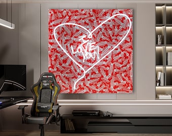 May include: A red and white canvas print with a heart shape made of white neon lights. The heart shape has the words "I love you" written inside. The background of the canvas is covered in red and white "fragile" stickers.