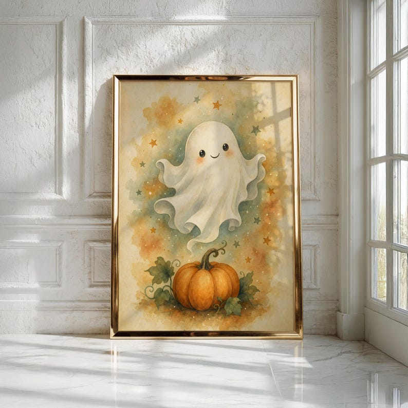 May include: A framed wall art print featuring a watercolor illustration of a smiling white ghost floating above an orange pumpkin. The background is a soft blend of yellow, orange, and green hues, decorated with small scattered stars in various colors.