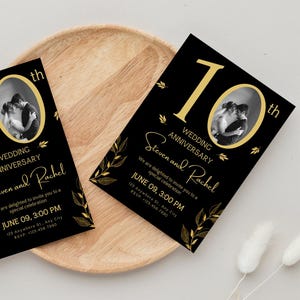 May include: Black and gold wedding anniversary invitations. The design features a photo of a couple, the words "10th Wedding Anniversary", and the names "Steven and Rachel". Includes event details.
