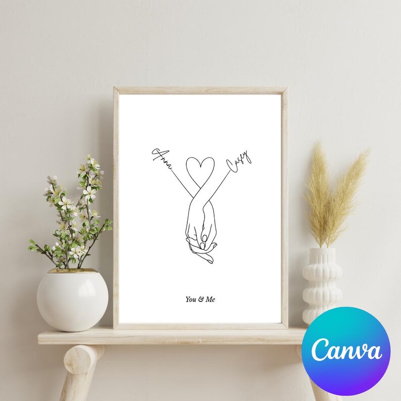 May include: A black and white line drawing of two hands holding each other, forming a heart shape. The names "Anna" and "Casey" are written above the hands, with the text "You & Me" below.