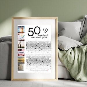 May include: A framed print with a white background and black text. The text reads "50 reasons we love you" and lists 50 reasons why someone is loved. The print includes several small photos of people and places.