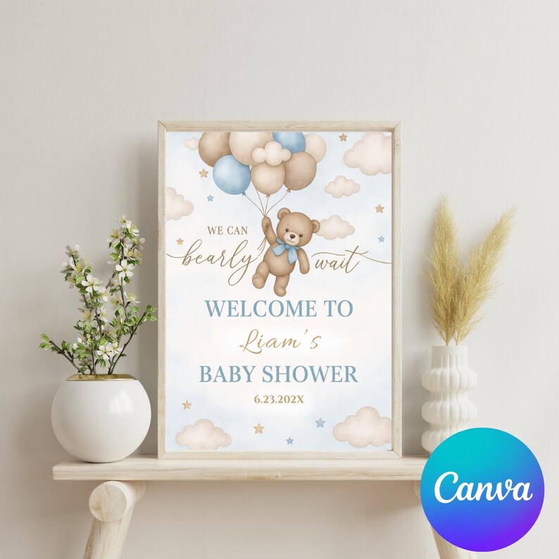 May include: A blue and brown baby shower welcome sign with a teddy bear holding balloons. The sign says "We can barely wait" and "Welcome to Liam's Baby Shower 6.23.202X".
