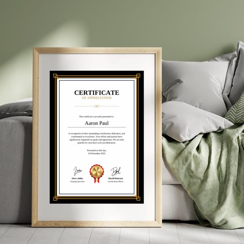 May include: A black and gold certificate of appreciation presented to Aaron Paul on November 24, 2023. The certificate recognizes outstanding contributions, dedication, and commitment to excellence. It is signed by Steve Jacobs, Training Specialist, and David Paterson, Certification Officer.