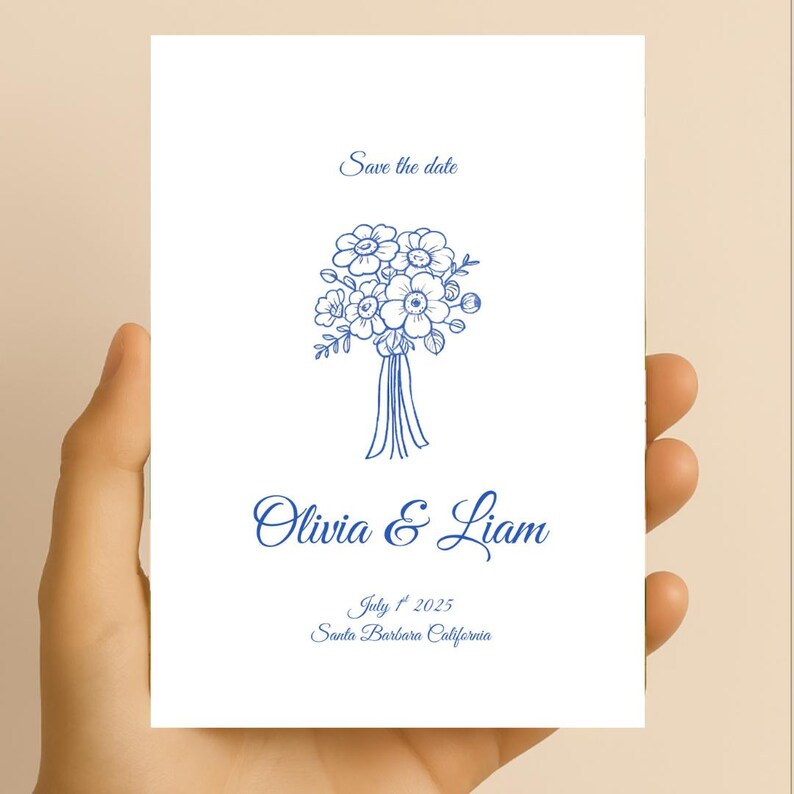 Puede incluir: Tarjeta de guardar la fecha con una ilustraci&oacute;n floral azul y el texto "Olivia & Liam" en cursiva. La fecha "1 de julio de 2025" y la ubicaci&oacute;n "Santa Barbara California" est&aacute;n impresas debajo de los nombres.