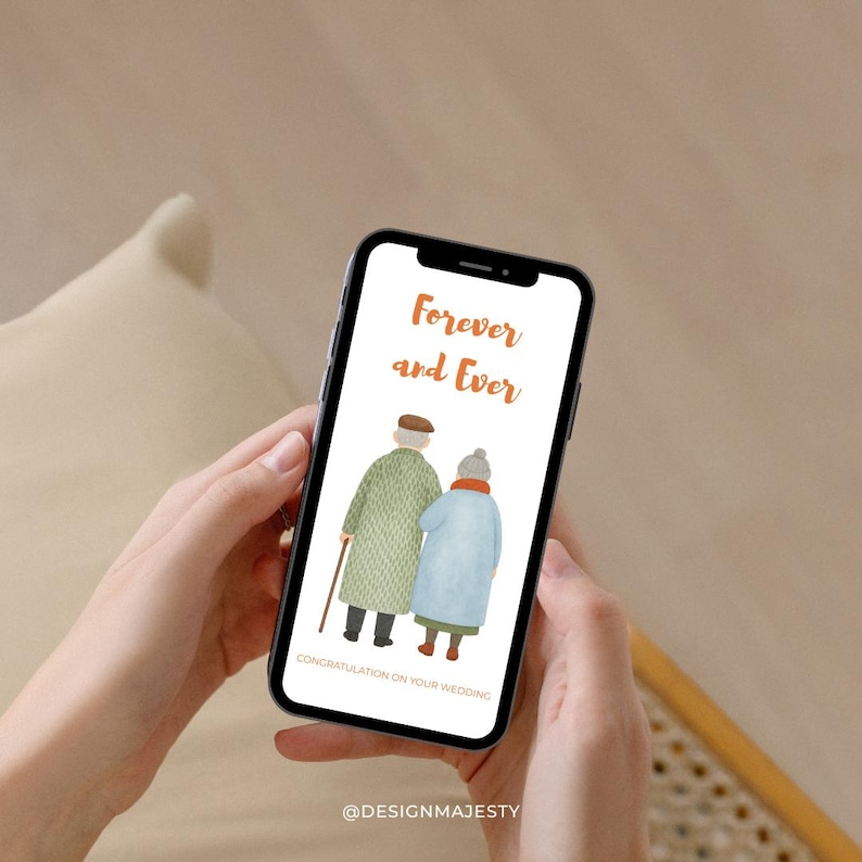 May include: A smartphone displays a watercolor illustration of an elderly couple with the text "Forever and Ever" in orange script. The image includes the text "CONGRATULATION ON YOUR WEDDING" and the @DESIGNMAJESTY logo.
